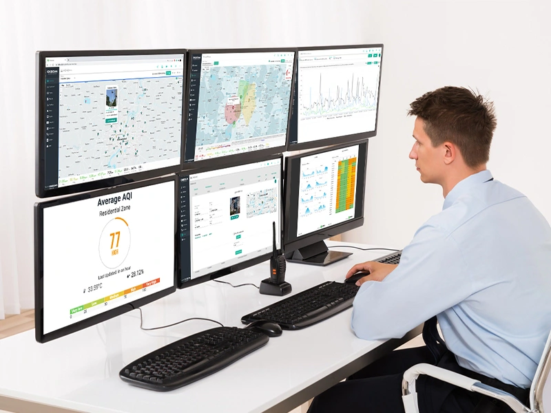 Facility manager overseeing monitoring data of air quality of a smart campus